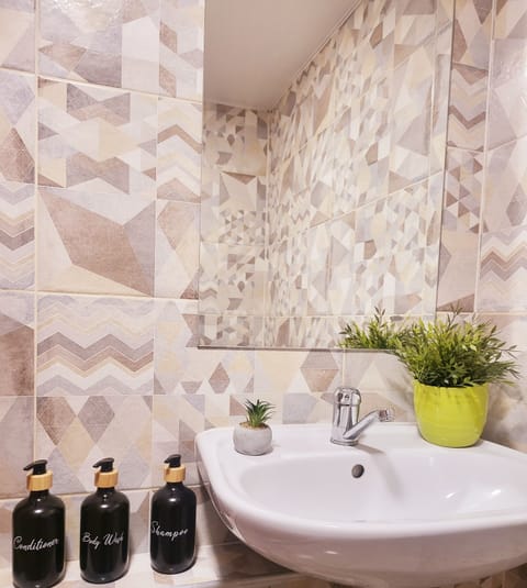 For your comfort, the bathroom is stocked with shampoo, body, wash, conditioner