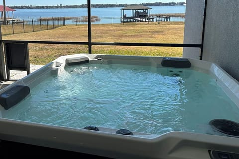 Hot tub in screened in Lanai