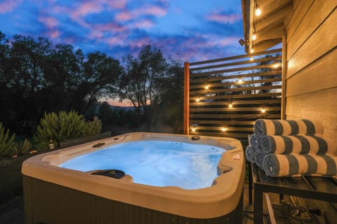 Soak under the stars in the private hot tub. A perfect way to relax after long days in the park.