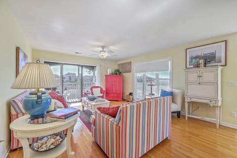 Soak up the marsh views and salty air from this light-filled, coastal-inspired living retreat.