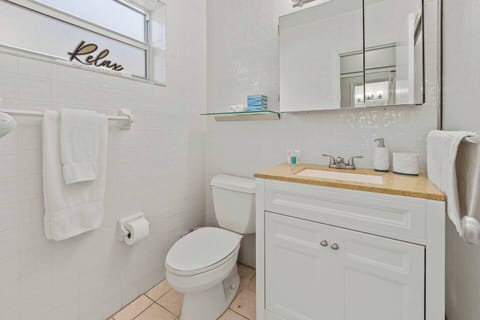 Perfectly sized bathroom to wash all that sand off. 