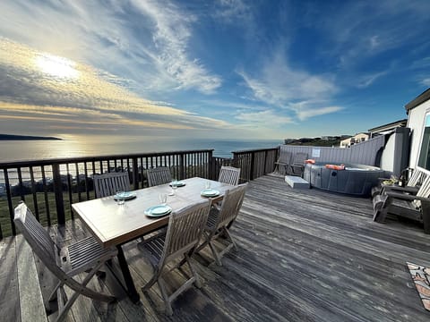Soak in the hot tub and soak up the view