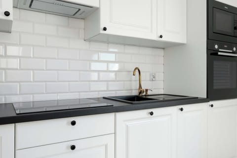 The kitchenette's practical layout maximizes space and functionality.