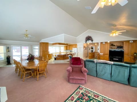 Expansive open-concept space with charm, ideal for meals, lounging, and family fun