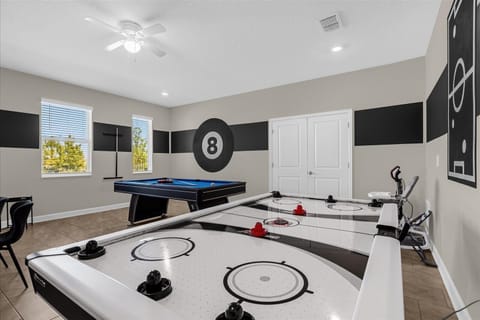Challenge your group to pool or air hockey — a favorite hangout for kids and adults alike.
