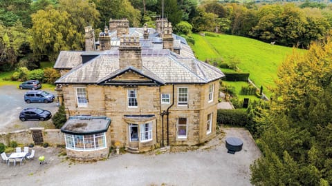 Charming Exterior: Bask in the beauty of lush gardens and stunning architecture at this historic retreat!Charming Exterior: Bask in the beauty of lush gardens and stunning architecture at this historic retreat!