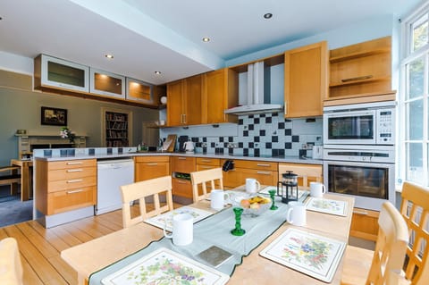 Gourmet Kitchen: Bright and airy space perfect for culinary adventures and family gatherings!