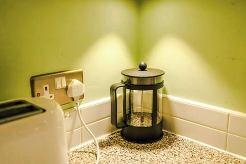 Coffee Station: Start your day with a fresh brew from this stylish French press!