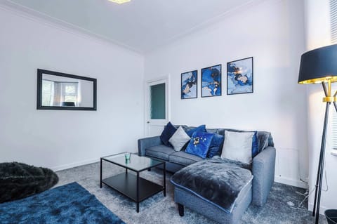 Living Room: Chill out in style with plush decor and vibrant artwork for perfect relaxation!