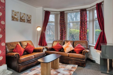 Living Room: Bright and airy with rich textures, perfect for unwinding after your adventures!