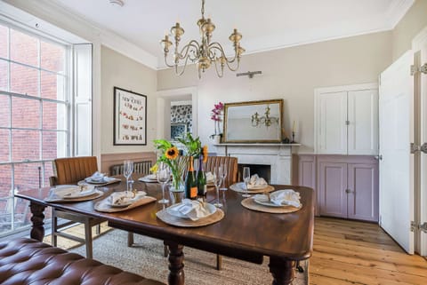Dining Room: Gather around a stunning table surrounded by charming decor and elegant lighting!