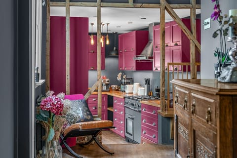Kitchen: Vibrant hues and stylish decor invite culinary adventures and relaxation!
