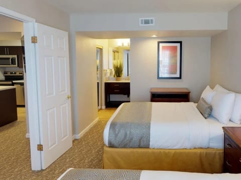 Stretch out in a spacious suite with calming, neutral tones.