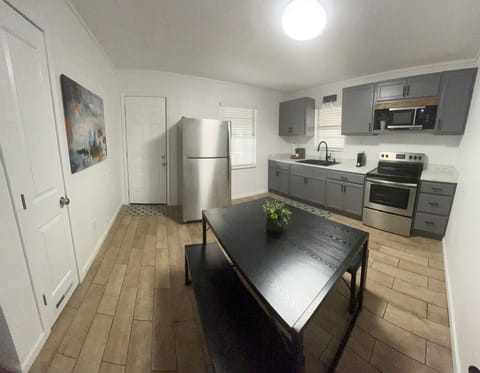 Fully stocked kitchen with coffee, creamer, sugar, etc