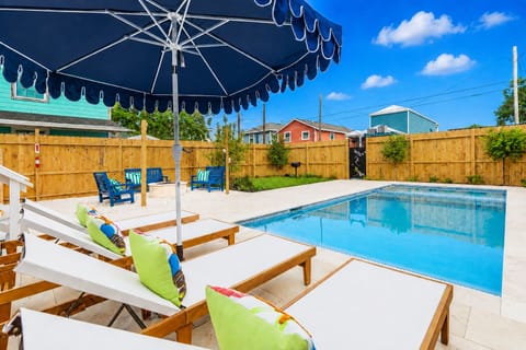On your own corner of the island—pool days come standard. Poolside seating set up for relaxing between swims.
