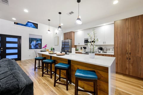 A bright, open kitchen made for gathering, cooking, and lingering conversations.