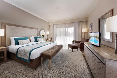Relax in a bright, airy room with plush seating.