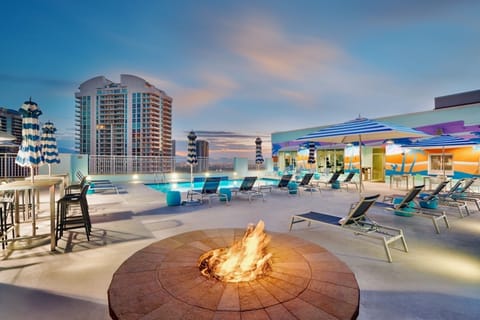 Gather by the fire pit, then cool off poolside.