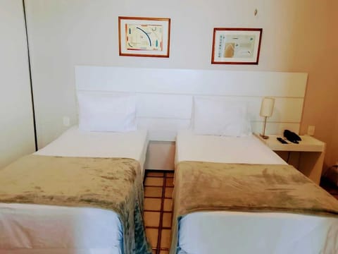 Settle into twin beds for a restful night’s sleep.