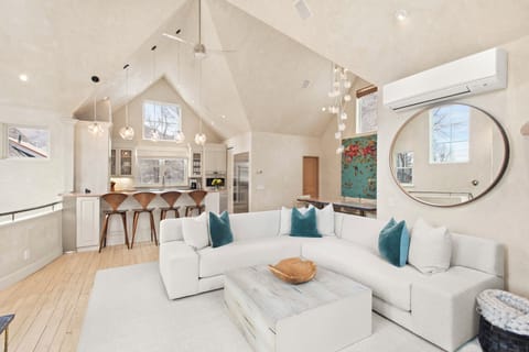 Top floor open-concept living/dining/kitchen. Views of Aspen Mountain from every window and a new rooftop hot tub.