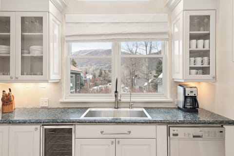 Newly remodeled, fully-stocked kitchen with double ovens.