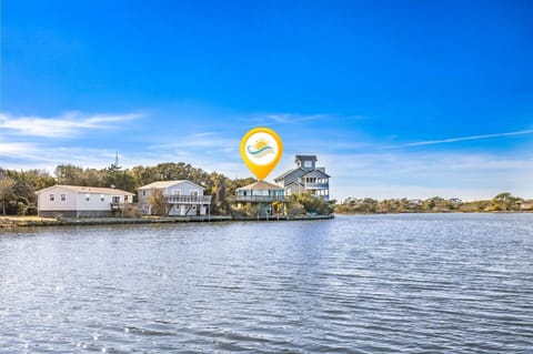 Ozzie's Island Hideaway sits right on the canal, offering serene water views and easy access for kayaking, paddleboarding, or simply relaxing by the water.