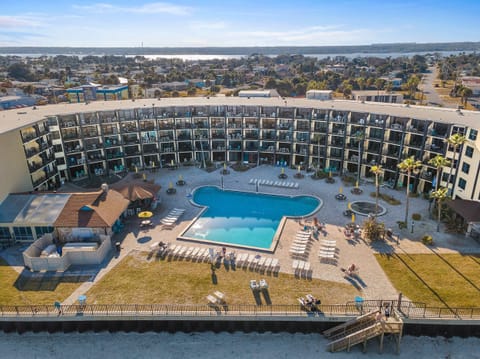 Enjoy the ultimate beach stay at this oceanfront condo featuring a sparkling resort-style pool, spacious sun deck, and direct beach access. Relax on your private balcony with stunning Gulf views and experience the perfect coastal vacation rental getaway.