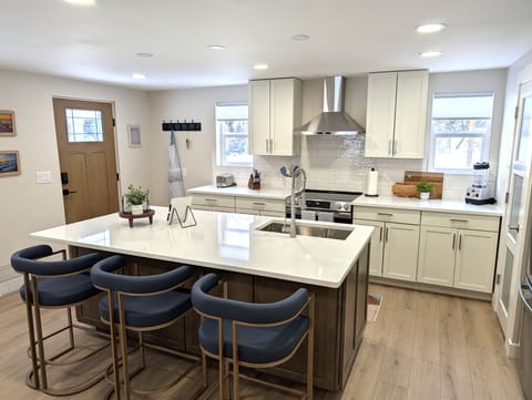 KITCHEN:  The home has a big and beautiful kitchen with all appliances including a dish washer, coffee bar, food pantry, and separate beverage cooler