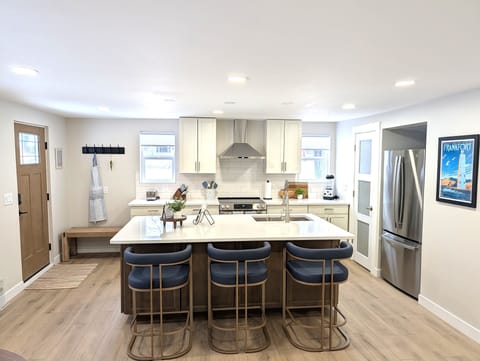 KITCHEN:  The home has a big and beautiful kitchen with all appliances including a dish washer, coffee bar, food pantry, and separate beverage cooler