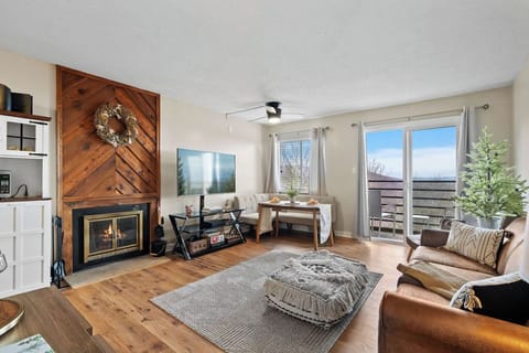 Spacious living room with seasonal fireplace, smart tv, and wifi through out the vacation rental