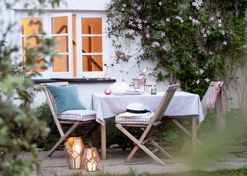Outdoor dining on the cottage terrace