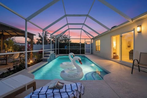 Private heated pool with lanai seating