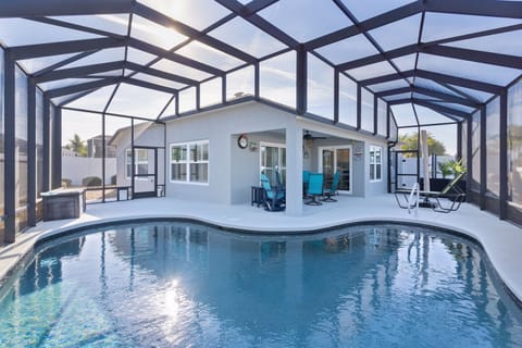 Your private screened pool oasis awaits, with crystal-clear waters and comfortable lounging areas perfect for soaking up the Florida sunshine.