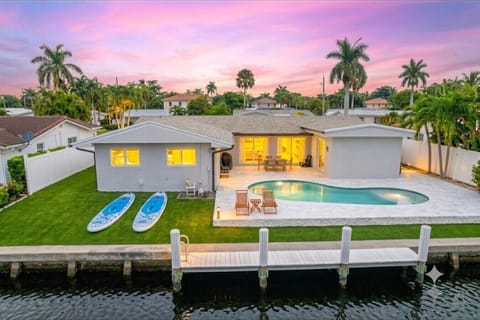 Spacious backyard with paddle boards