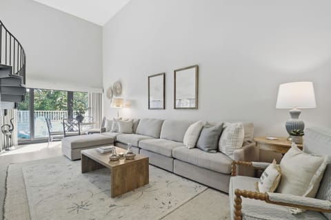 Spacious living room open to the back deck