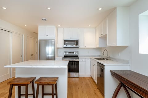 Charming white kitchen with warm touches