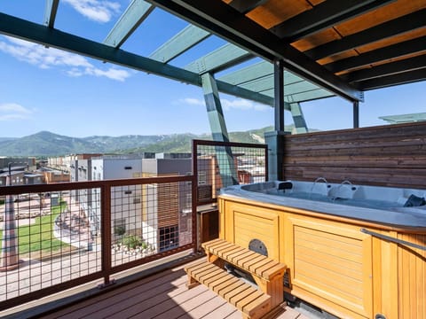 Private hot tub with mountain views