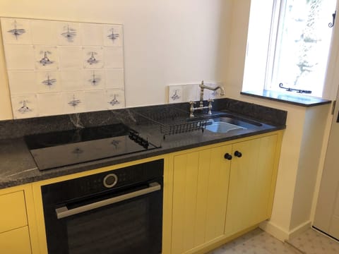 Well equipped, galley style kitchen | The Anchorage, Staithes, near Whitby