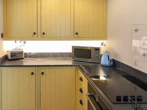 Well equipped, galley style kitchen | The Anchorage, Staithes, near Whitby