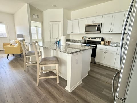 Create unforgettable meals in this beautifully designed, fully equipped kitchen. Gather your group to savor delightful dining experiences in the elegant dining area.