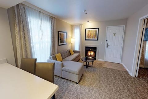 Relax by the cozy fireplace after a full day exploring.