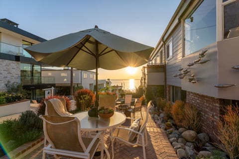 This sunlit patio offers a serene setting for morning coffee or sunset gatherings.