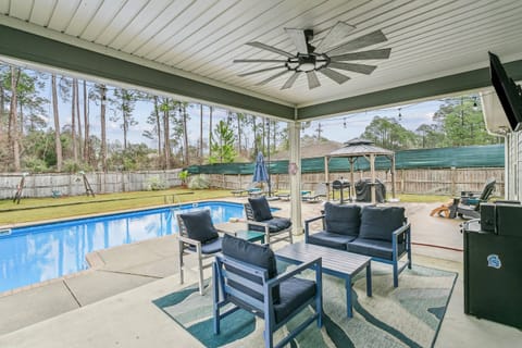 Enjoy cold beers by the pool in the covered patio