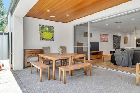 Spacious dining zone connecting the kitchen and outdoors.