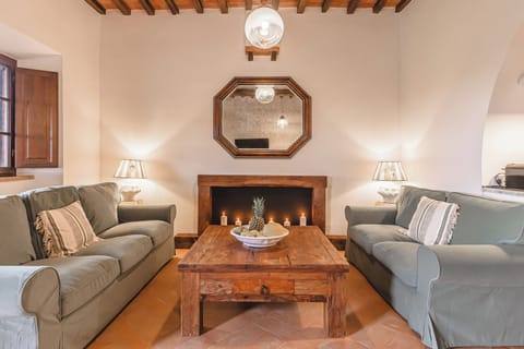 Spacious living area with comfortable seating. perfect for relaxing together.