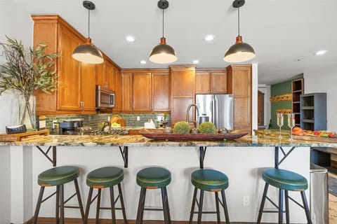 Kitchen: Drip coffee maker, Crockpot, blender, food processor, tableware