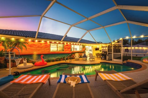 Heated in ground pool with new screened lanai