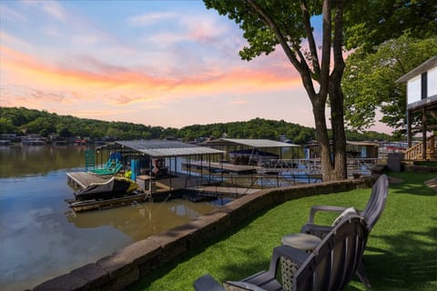 Relax on the lakeside patio with private dock access