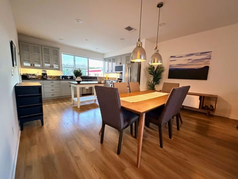 Main living space looking toward the dining room and kitchen.