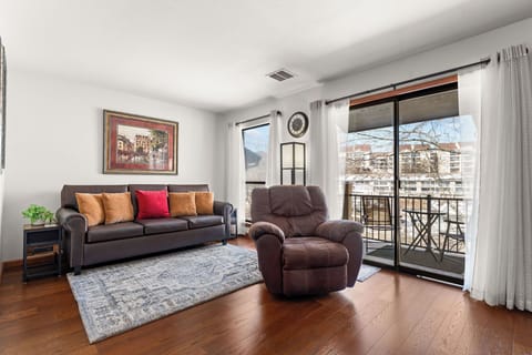 Bright living room with balcony access